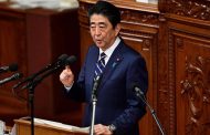 Japan's Abe says willing to meet with Kim Jong Un
