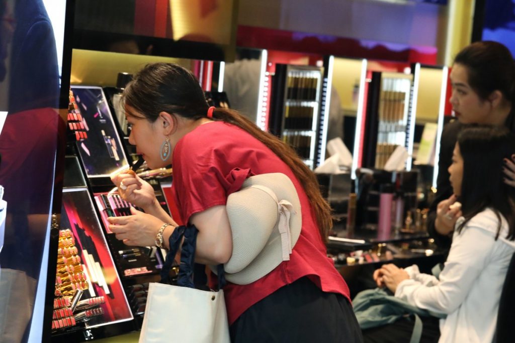 China cuts tax on personal items bought overseas in move to boost consumption
