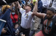 The police who stunned Americans – by taking a knee with protesters