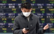 Japan plunges more than 3%, with stocks in Asia dropping as virus fears resurface